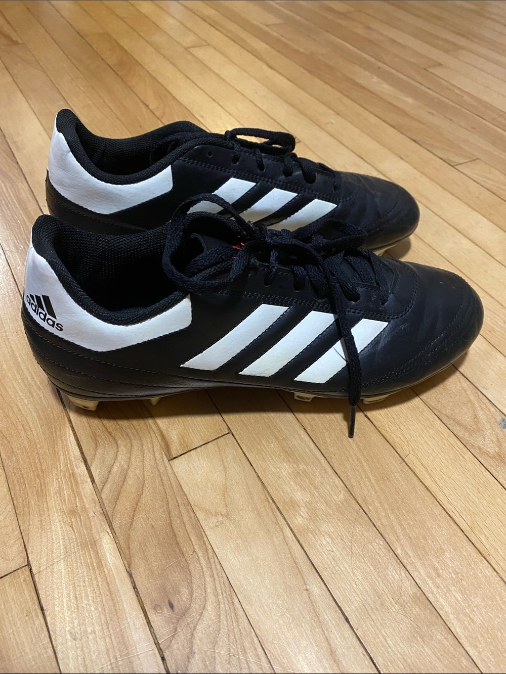 adidas Black & White Men’s Athletic Soccer Shoes with Red Logo Accent